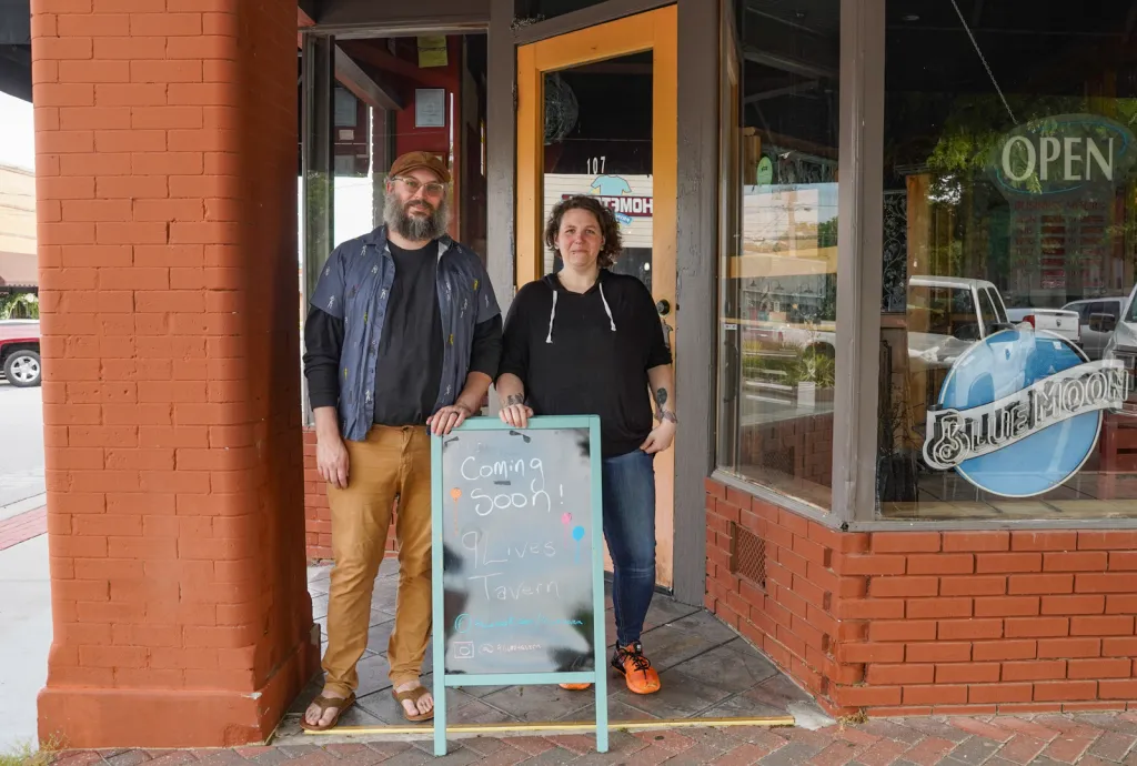 Amos and Shelby Hale outside 9 Lives Tavern